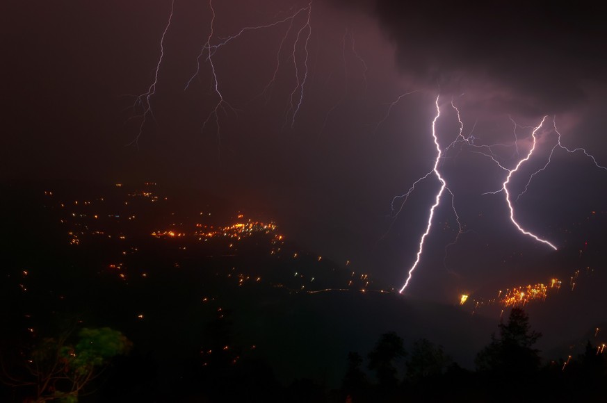 Night image of Sikkim, India. Himalayan mountains in the background. Model Released Property Released xkwx india village natural glow bright cold mountain peak indian mountains view beautiful dark sky ...