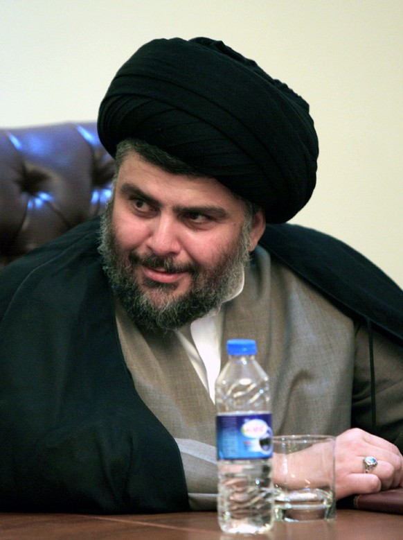 epa10145383 (FILE) - Moqtada al-Sadr the leader of Iraq&#039;s Sadrist movement attends the meeting of Iraqi leaders in Erbil, Iraq, 28 April 2012 (reissued 29 August 2022). Moqtada al-Sadr on 29 Augu ...