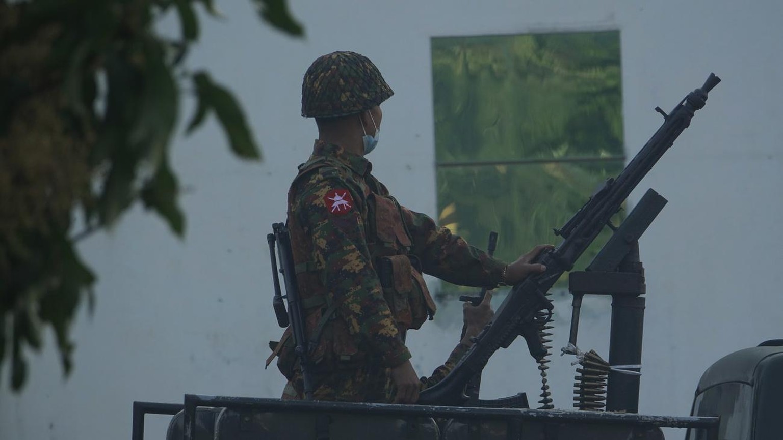 epa09005676 A Myanmar army soldier stands guard during the parade to mark the 74th anniversary of Myanmar&#039;s Union Day in Sittwe, Rakhine State, Myanmar, 12 February 2021. Union Day, a public cele ...