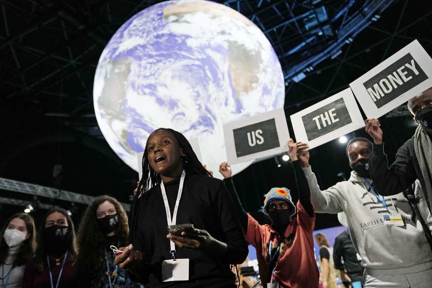 FILE - Climate activist Vanessa Nakate engages in a 'Show US The Money' protest at the COP26 U.N. Climate Summit in Glasgow, Scotland, Nov. 8, 2021. African officials outlined their priorities for the ...