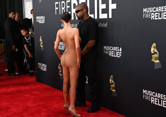 LOS ANGELES, CALIFORNIA - FEBRUARY 02: (FOR EDITORIAL USE ONLY) (EDITOR&#039;S NOTE: Image contains nudity.) (L-R) Bianca Censori and Kanye West attend the 67th GRAMMY Awards on February 02, 2025 in L ...