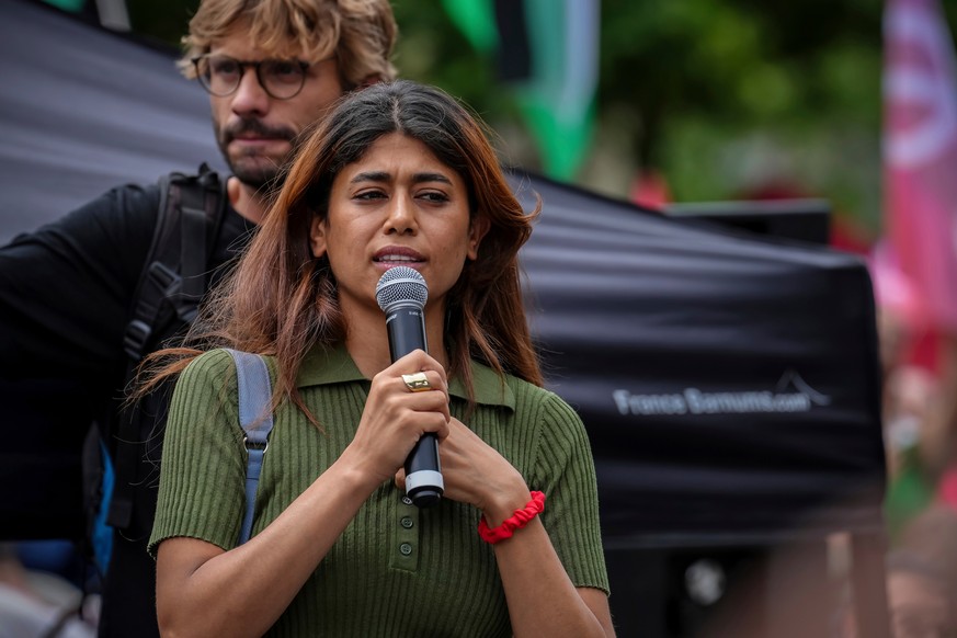 FILE- Member of European Parliament Rima Hassan delivers a speech during a pro-Palestinian demonstration called by several trade unions in Paris, France, Saturday, June 14, 2025. (AP Photo/Aurelien Mo ...