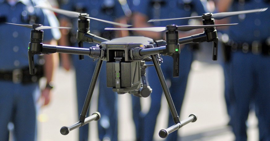 In a Thursday Sept. 28, 2017 file photo, a Maine State Police unmanned aerial vehicle hovers outside Maine State Police headquarters at the Central Maine Commerce Center in Augusta, Me. More than a ye ...