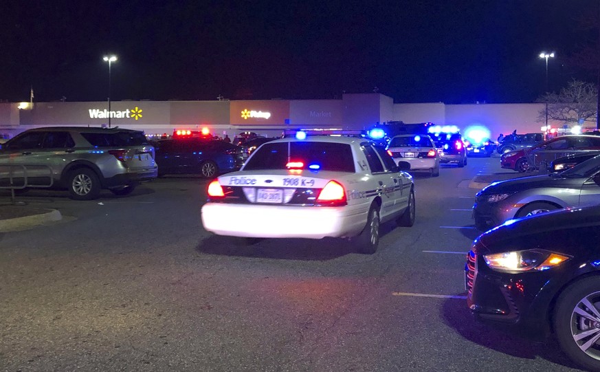 In this image from video Virginia police respond to the scene of a fatal shooting at a Walmart on Tuesday night, Nov. 22, 2022, in Chesapeake, Va. (WAVY-TV 10 via AP)