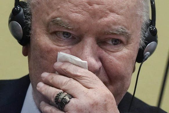 Former Bosnian Serb military chief Ratko Mladic sits in the court room in The Hague, Netherlands, Tuesday, June 8, 2021, where the United Nations court delivers its verdict in the appeal of Mladic aga ...