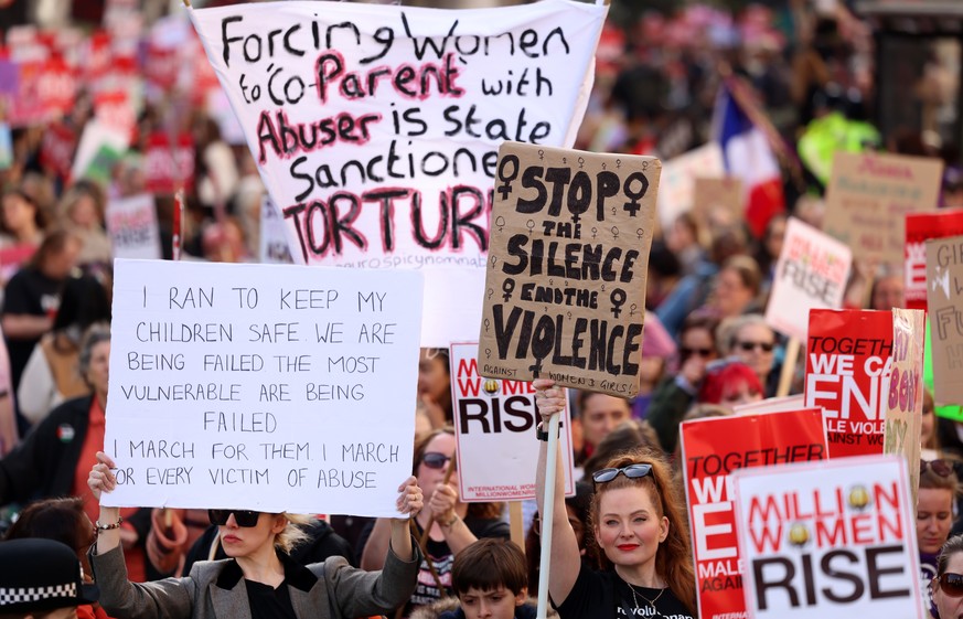 epa11949408 Thousands of protesters demonstrate during the Million Women Rise march on International Womens Day in London, Britain, 08 March 2025. Women around the world marked International Womens Da ...