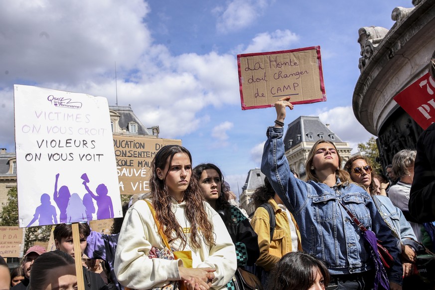 epa11603702 People carry banners with the messages &#039;Shame must change sides&#039; and &#039;Victims we believe you, rapists we see you&#039; durin a feminist demonstration also in support of Gise ...