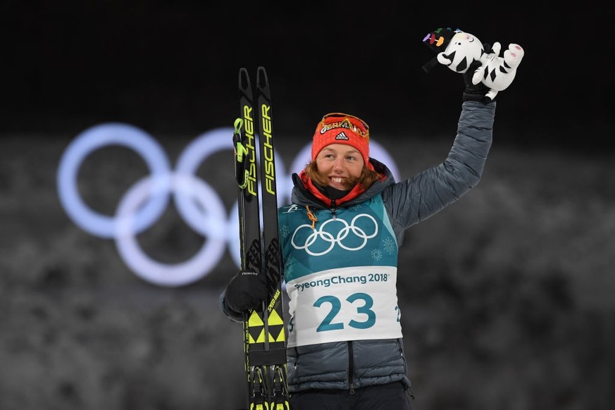 PYEONGCHANG-GUN, SOUTH KOREA - FEBRUARY 10: Gold medalist Laura Dahlmeier of Germany celebrates during the victory ceremony for the Women&#039;s Biathlon 7.5km Sprint on day one of the PyeongChang 201 ...
