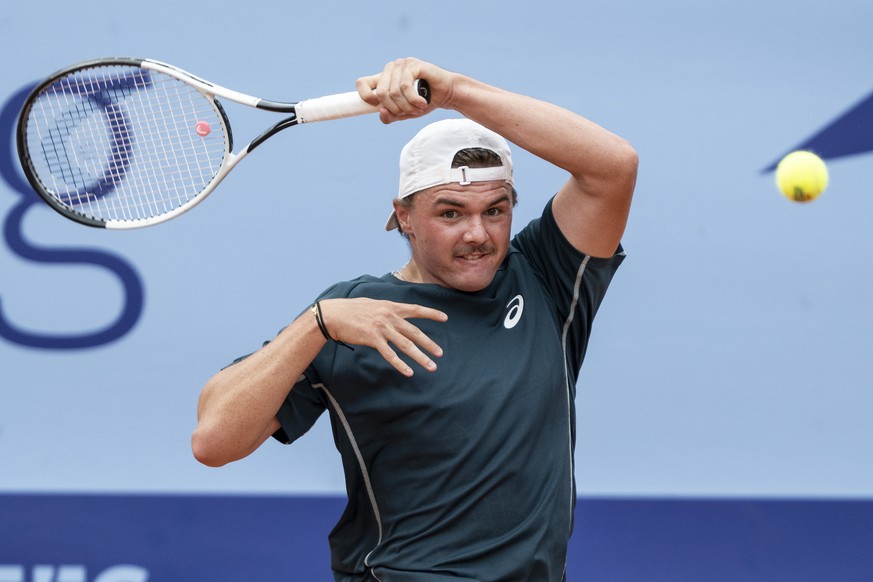 Dominic Stricker of Switzerland in action against Casper Ruud of Norway at the Swiss Open tennis tournament in Gstaad, Switzerland, on Wednesday, July 16, 2025. (KEYSTONE/Peter Schneider)