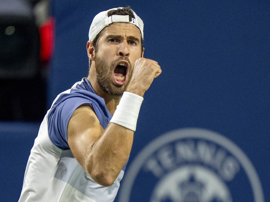 Karen Khachanov of Russia celebrates on his way to defeating Alex Michelsen of the United States, during their quarterfinal match at the National Bank Open men&#039;s tennis tournament in Toronto, Mon ...