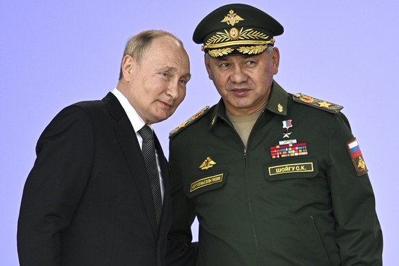 FILE Russia&#039;s President Vladimir Putin and Russian Defense Minister Sergei Shoigu attend the opening of the Army 2022 International Military and Technical Forum in the Patriot Park outside Moscow ...