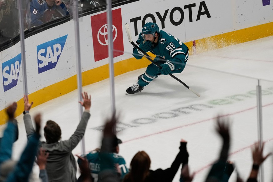 San Jose Sharks center Philipp Kurashev (96) celebrates after scoring the winning goal during overtime of an NHL hockey game against the Colorado Avalanche in San Jose, Calif., Saturday, Nov. 1, 2025. ...
