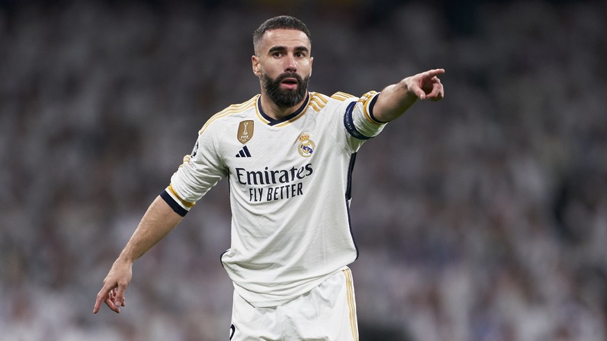 MADRID, SPAIN - NOVEMBER 29: Daniel Carvajal of Real Madrid reacts during the UEFA Champions League match between Real Madrid and SSC Napoli at Estadio Santiago Bernabeu on November 29, 2023 in Madrid ...