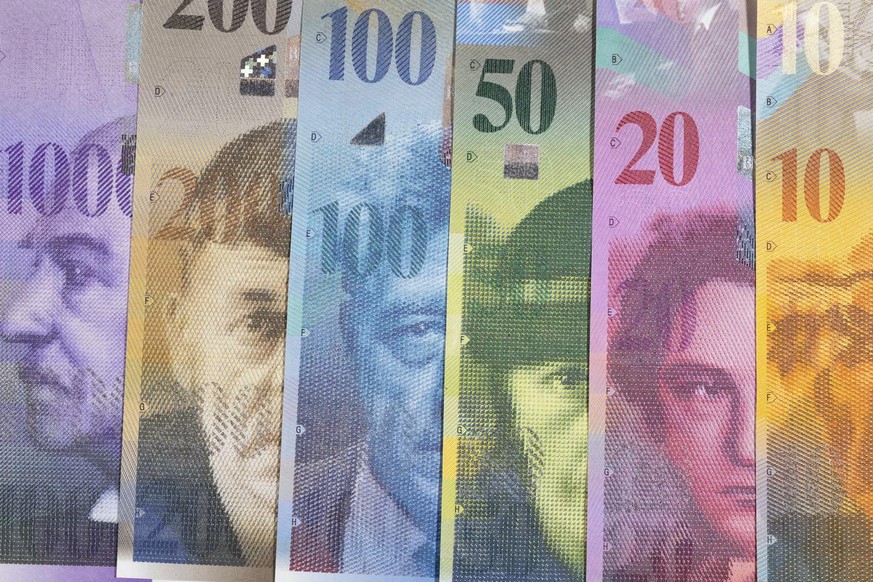 A thousand, a two hundred, a hundred, a fifty, a twenty and a ten Swiss franc bill (from left to right) from the eighth banknote series, pictured in Zurich, Switzerland, on August 28, 2018. (KEYSTONE/ ...