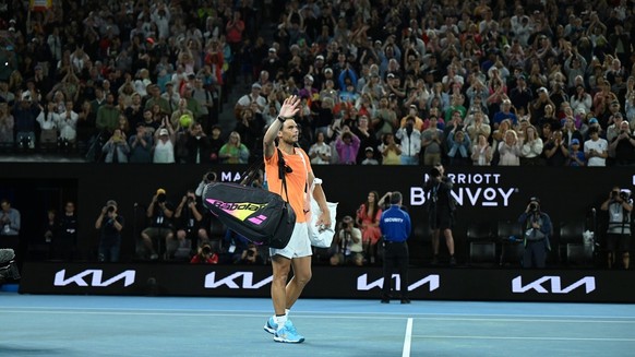 epa10412512 Rafael Nadal of Spain walks off after losing his match against Mackenzie McDonald of the USA the 2023 Australian Open tennis tournament in Melbourne, Australia, 18 January 2023. EPA/LUKAS  ...