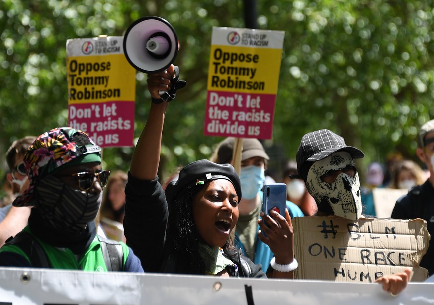 FILE - In this Saturday, June 13, 2020 file photo Sasha Johnson, center, of the Black Lives Matter movement attends a protest at Hyde Park in London. Johnson, a British Black Lives Matter campaigner i ...