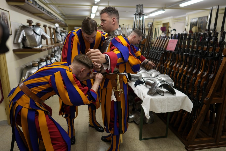Vatican Swiss Guard recruits prepare for their swearing-in ceremony, at the Vatican, Monday, May 6, 2024. The ceremony is held each May 6 to commemorate the day in 1527 when 147 Swiss Guards died prot ...