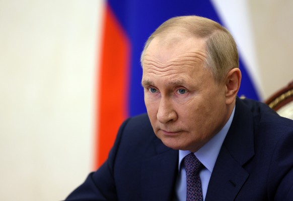 epa10170086 Russian President Vladimir Putin takes part in a ceremony to open new and reconstructed transport network sections in several regions, including the M12 and M5 motorways, as well as the Ye ...