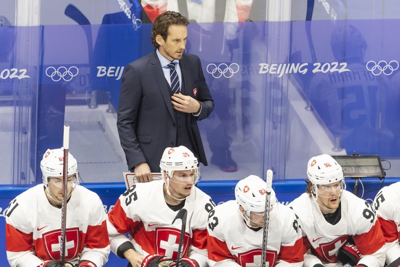 Patrick Fischer, head coach of Switzerland national ice hockey team, watches the game, during the men's ice hockey preliminary round game between Czech Republic and Switzerland at the National In ...