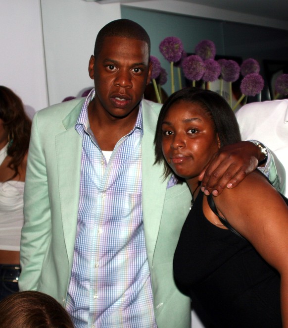 Jay-Z and Jaguar Wright during 40/40 Club 2nd Anniversary Party at 40/40 Club in New York City, New York, United States. (Photo by Johnny Nunez/WireImage)