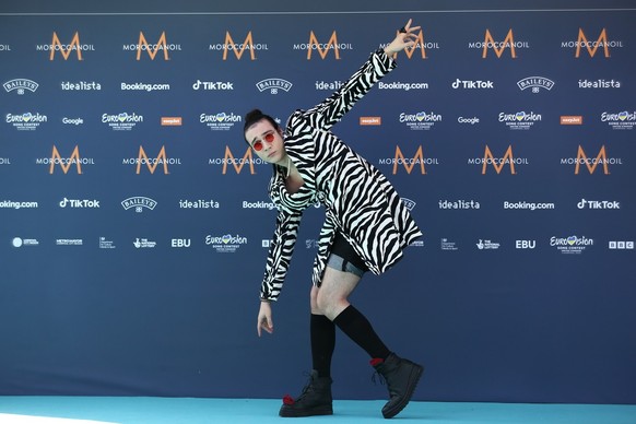 epa10614090 The entry from Romania, Theodor Andrei, arrives on the Turquoise Carpet for the Opening Ceremony of the 67th annual Eurovision Song Contest (ESC) at The Walker Art Gallery in Liverpool, Br ...