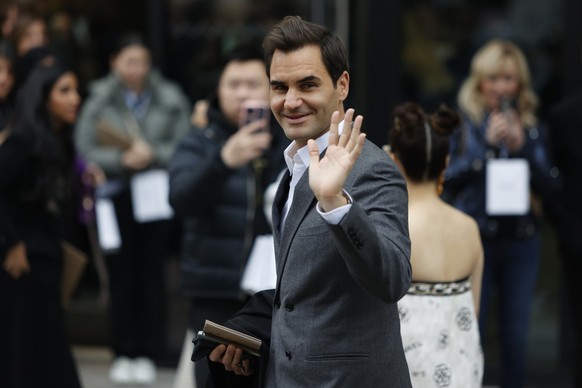 Roger Federer leaves after Chanel Haute Couture Spring-Summer 2023 collection presented in Paris, Tuesday, Jan. 24, 2023. (AP Photo/Lewis Joly)