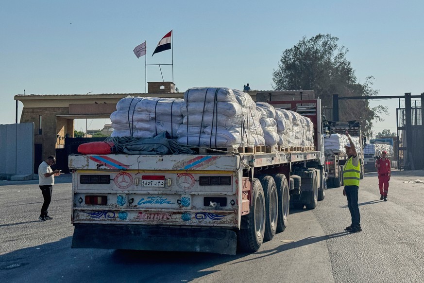 Trucks carrying humanitarian aids enter the Rafah crossing between Egypt and the Gaza Strip, Sunday, July 27, 2025. (AP Photo/Mohamed Arafat)
Egypt Israel Palestinians