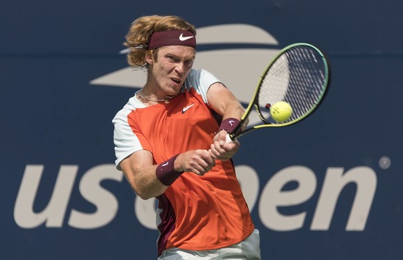 epa10161953 Andrey Rublev of Russia hits a return to Cameron Norrie of the United Kingdom during their fourth round match of the US Open Tennis Championships at the USTA National Tennis Center in the  ...