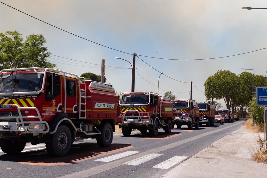 epa13080067 Fire engines arrive to help in extinguishing a wildfire burning in Sainte-Valiere, Aude department, southern France, 02 July 2026. A large wildfire has been raging in southern France since ...