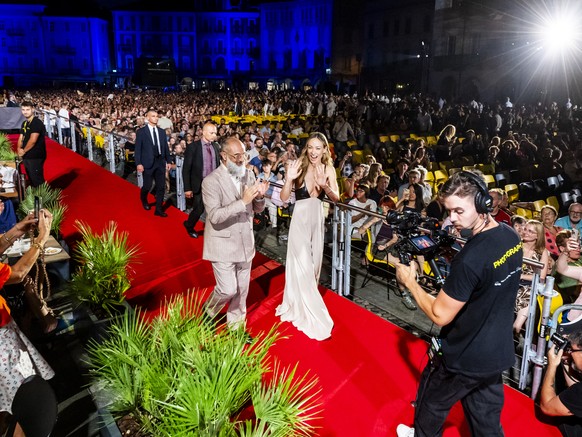 Olivia Wilde, American and Irish film director and actress arrives on the red carpet of the Piazza Grande next to Giona A. Nazzaro, Artistic Director of Locarno Film Festival for the movie "The I ...
