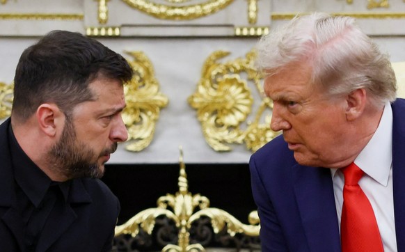 U.S. President Donald Trump and Ukrainian President Volodymyr Zelenskiy meet at the Oval Office of the White House, amid negotiations to end the Russian war in Ukraine, in Washington, D.C., U.S., Augu ...