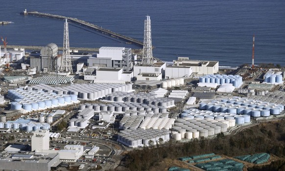 This photo shows part of the tsunami-wrecked Fukushima Daiichi nuclear power plant in Okuma town, northeastern Japan, on Jan. 19, 2023. Japanese Prime Minister Fumio Kishida made a brief visit to the  ...