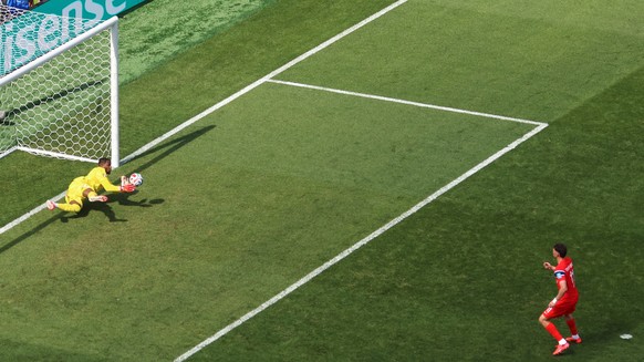 KEYPIX - France goalkeeper Mike Maignan (16) saves a penalty kick by Norway's Joergen Strand Larsen (11) during the World Cup Group I soccer match between Norway and France in Foxborough, Mass.,  ...