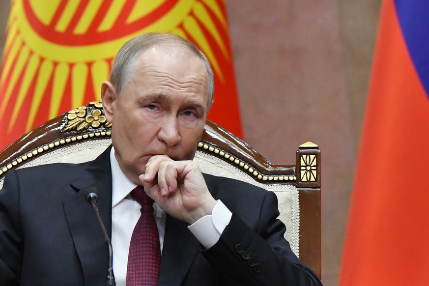 Russian President Vladimir Putin attends a signing ceremony with Kyrgyzstan President Sadyr Japarov at the administrative complex Yntymak-Manas Ordo, in Bishkek, Kyrgyzstan, on Wednesday, Nov. 26, 202 ...