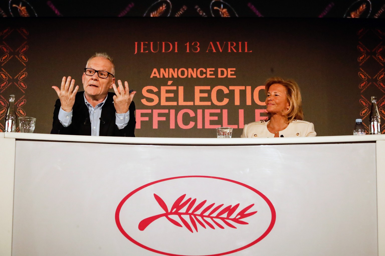 epa10570596 General Delegate of the Cannes Film Festival Thierry Fremaux (L) and festival&#039;s president Iris Knobloch speak during a press conference to present the 76th Cannes Film Festival Offici ...