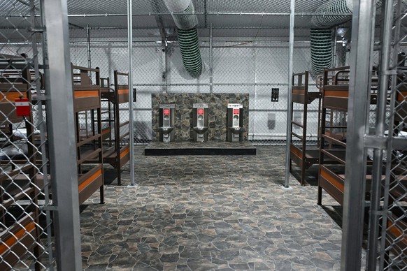 Toilets and beds are seen inside a migrant detention center, dubbed &quot;Alligator Alcatraz,&quot; located at the site of the Dade-Collier Training and Transition Airport in Ochopee, Florida on July  ...