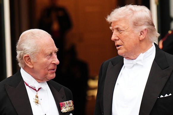 PA via Reuters
King Charles III and President Donald Trump arrive for the State Dinner at the White House in Washington DC, on day two of the state visit to the US. Picture date: Tuesday April 28, 20 ...