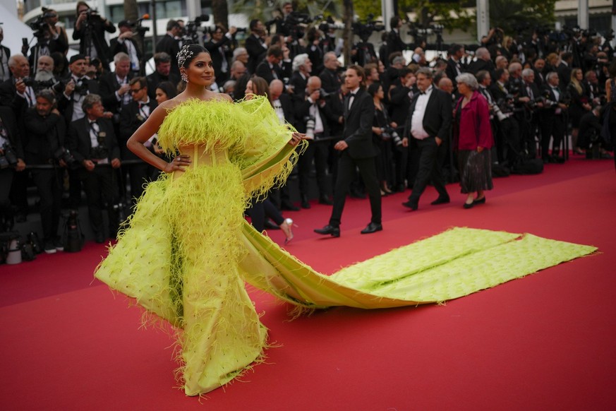 Farhana Bodi poses for photographers upon arrival at the opening ceremony and the premiere of the film 'Jeanne du Barry' at the 76th international film festival, Cannes, southern France, Tue ...