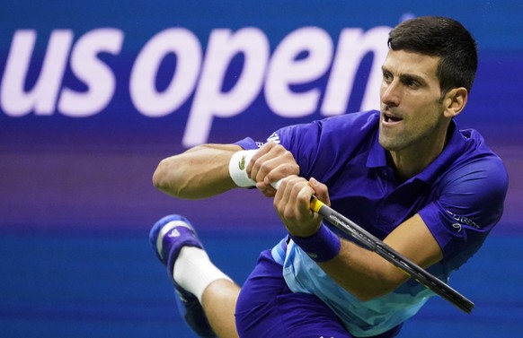 FILE - Novak Djokovic, of Serbia, returns a shot to Alexander Zverev, of Germany, during the semifinals of the U.S. Open tennis championships, Friday, Sept. 10, 2021, in New York. Djokovic will not pl ...