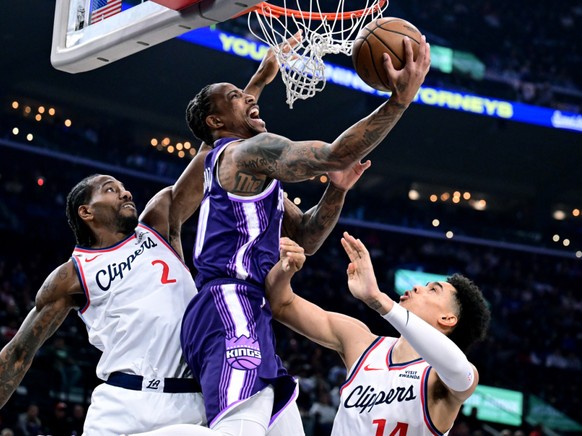 L'image est trompeuse: Yanic Konan Niederhäuser (à droite) et les Clippers ont dominé les Sacramento Kings mardi