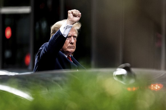 Former President Donald Trump gestures as he departs Trump Tower, Wednesday, Aug. 10, 2022, in New York, on his way to the New York attorney general&#039;s office for a deposition in a civil investiga ...