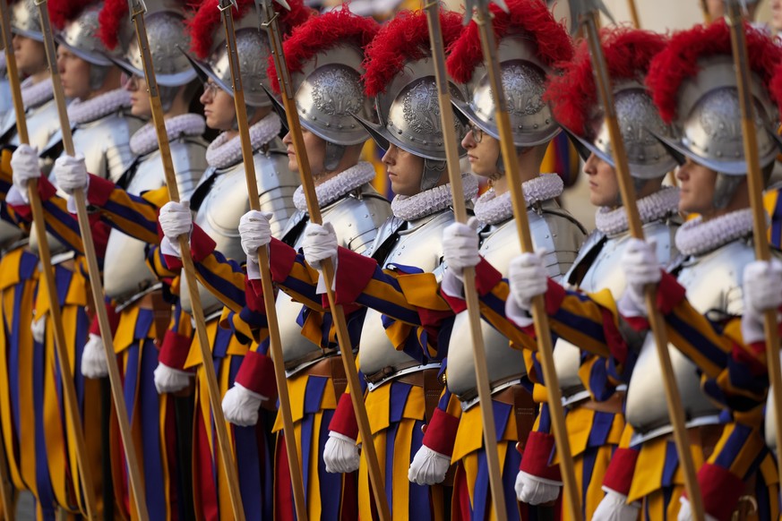 Vatican Swiss Guard recruits line up for their swearing-in ceremony, at the Vatican, Monday, May 6, 2024. The ceremony is held each May 6 to commemorate the day in 1527 when 147 Swiss Guards died prot ...