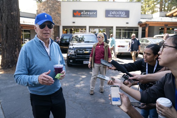 President Joe Biden speaks with reporters after taking a pilates and spin class at PeloDog, Wednesday, Aug. 23, 2023, in South Lake Tahoe, Calif. (AP Photo/Evan Vucci)
Joe Biden