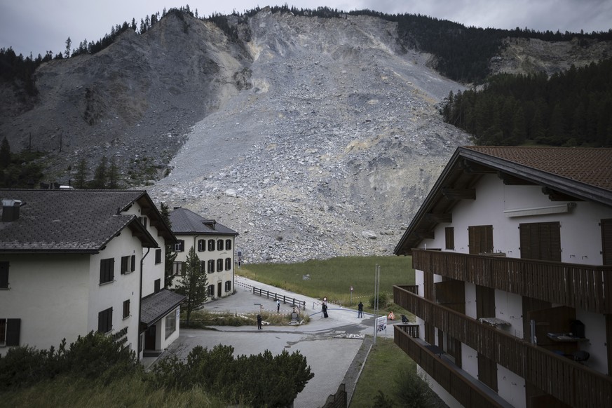 The rocks of a rockslide are seen during a media tour in Brienz, Switzerland, Wednesday, June 28, 2023. Brienz was evacuated on May 12 after geology experts warned that Alpine rock looming over the vi ...