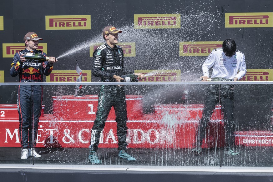 epa12177962 Mercedes driver George Russell of Britain, first place, (C), Red Bull Racing driver Max Verstappen of Netherlands, second place (L) and Mercedes driver Andrea Kimi Antonelli of Italy, thir ...