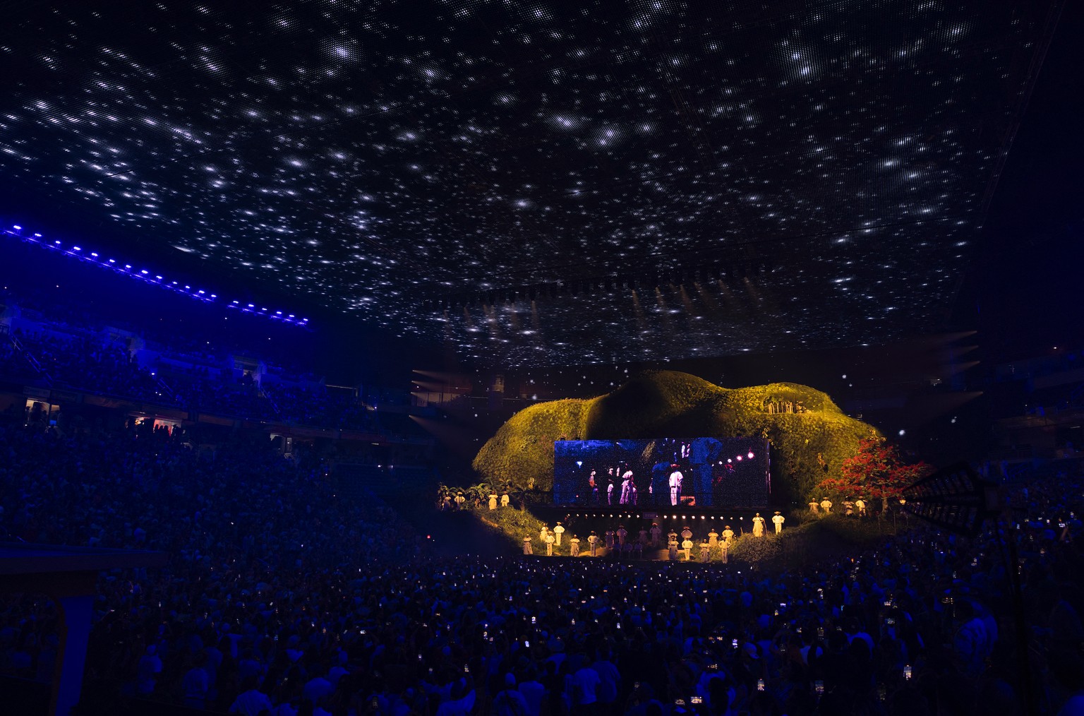 An aerial view shows people queing outside the Coliseo de Puerto Rico to attend the first show of Puerto Rican singer Bad Bunny&#039;s 30-date concert residency at the arena in San Juan, Puerto Rico,  ...