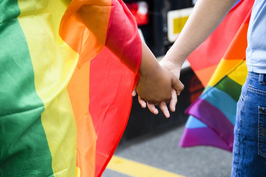 Members of the Gay and Lesbian community participate at the Gay Pride parade in Fribourg, Switzerland, 25 June 2016. (KEYSTONE/Manuel Lopez)