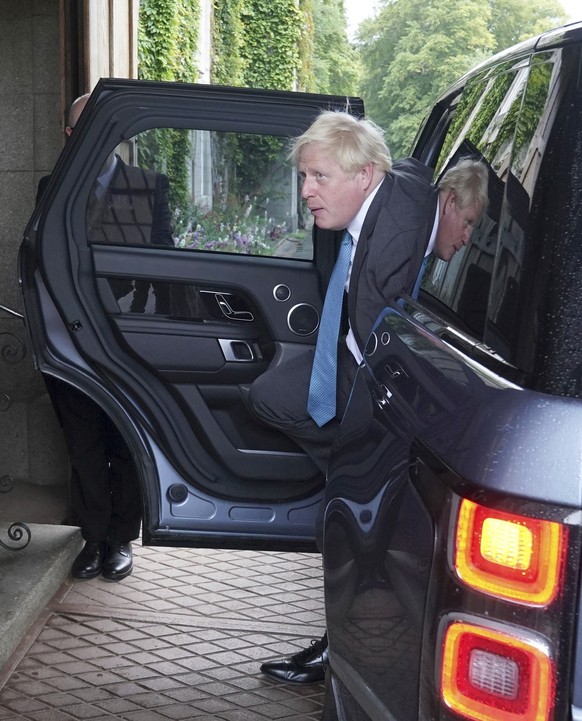 Outgoing Prime Minister Boris Johnson arrives at Balmoral where Johnson will formally resign as Prime Minister, in Aberdeenshire, Scotland, Tuesday, Sept. 6, 2022. (Andrew Milligan/Pool Photo via AP)
