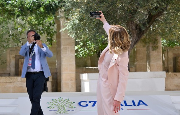 FASANO, ITALY - JUNE 13: Italy's Prime Minister Giorgi Meloni greets President of France Emmanuel Macron during the first day of the G7 meeting at Borgo Egnazia resort, on June 13, 2024 in Fasano ...