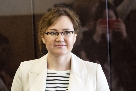 FILE - Lilia Chanysheva stands in a cage during a hearing in a courtroom of the Kirovskiy District Court in Ufa, Russia, Wednesday, June 14, 2023. A court in Russia on Tuesday added two more years to  ...